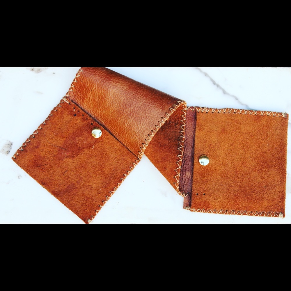 Hand crafted leather pouch/fold